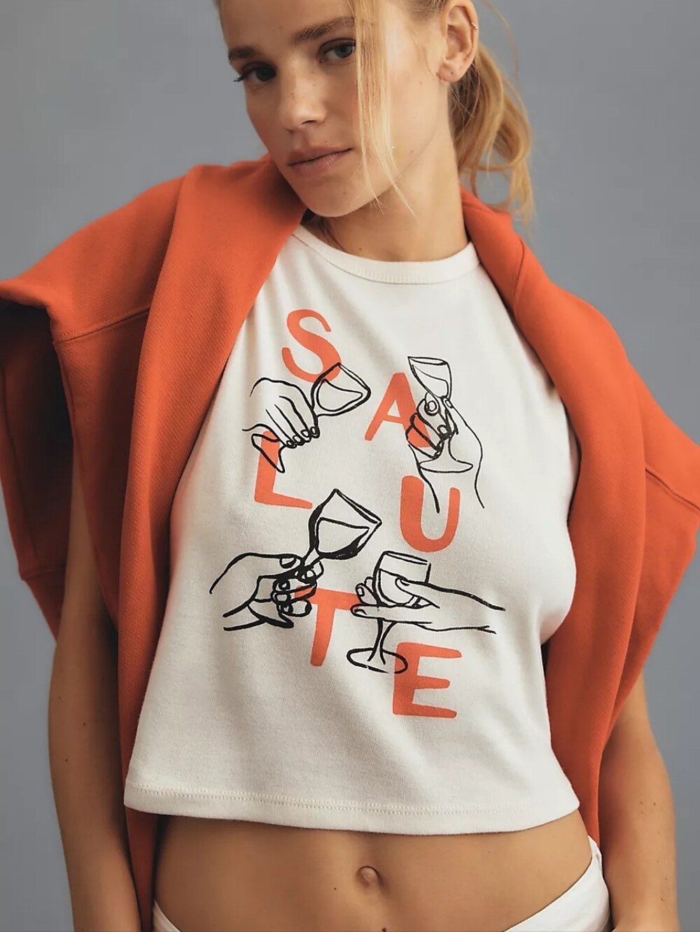 ANTHROPOLOGIE | GIRL DANGEROUS Red Salute Graphic Baby Tee Cream